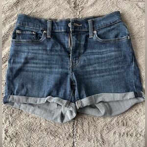 Levi mid length jean shorts - 26 waist size